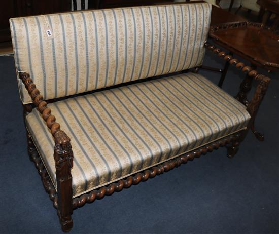 A Carolean style walnut settee, W.132cm